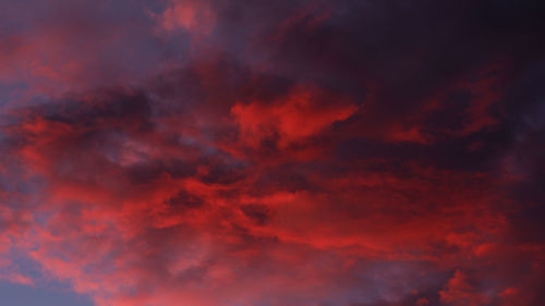 Low angle view of dramatic sky during sunset