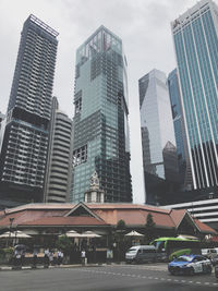 Modern buildings in city against sky