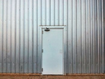 Closed door in corrugated iron