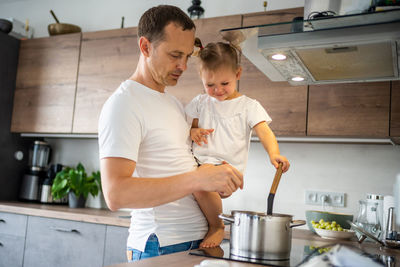 Man preparing food in kitchen