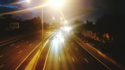 Illuminated street lights at night