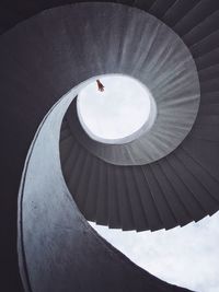 Low angle view of spiral staircase against sky