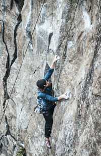 Man climbing on rock