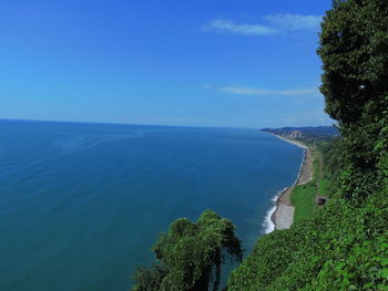 Scenic view of sea against blue sky