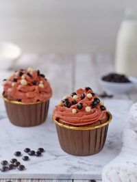 Close-up of cupcakes on table