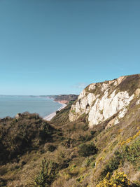 Scenic view of sea against clear blue sky
