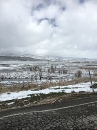 Aerial view of frozen landscape against sky