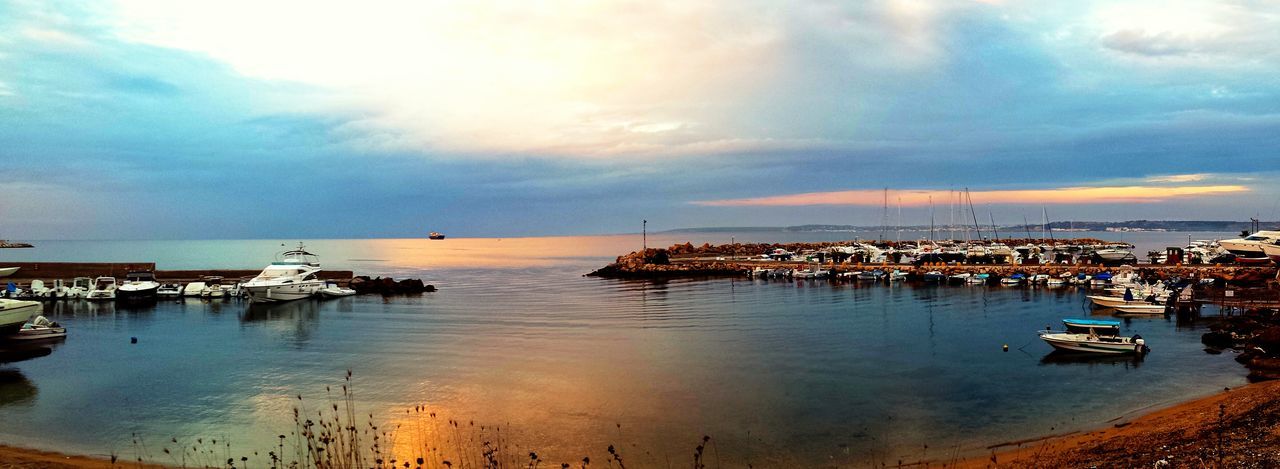 water, sea, nautical vessel, sky, moored, boat, transportation, mode of transport, cloud - sky, tranquil scene, scenics, tranquility, sunset, horizon over water, reflection, harbor, beauty in nature, cloud, nature, cloudy