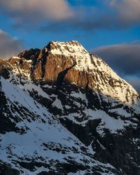 Scenic view of snowcapped mountain against sky