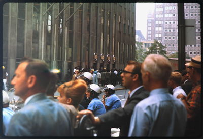 Man looking at city street