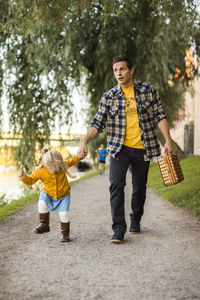 Father walking with girl