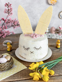 Easter cake decorated as a bunny. holiday, food, desert, spring, easter eggs, flowers.