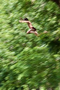 Side view of a man jumping