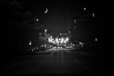 Illuminated street lights at night