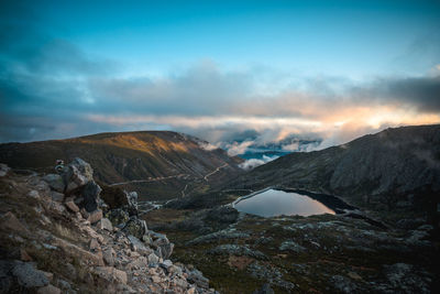 Scenic view of mountains against sky during sunset