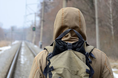 Rear view of man with backpack