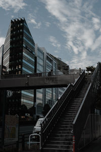 Modern buildings in city against sky