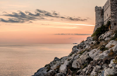 Scenic view of sea at sunset