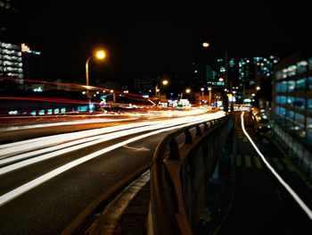 Light trails on city street at night