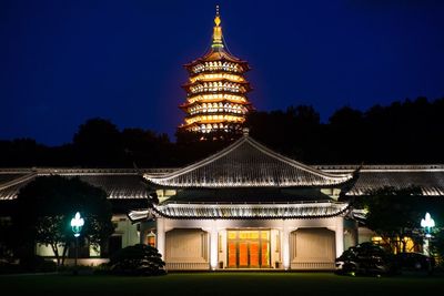 Illuminated cathedral against sky at night