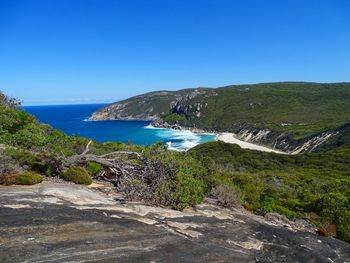 Scenic view of calm sea against clear sky