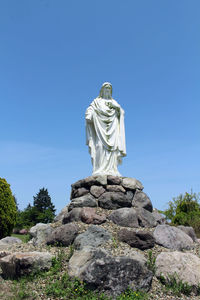 Low angle view of statue against clear sky