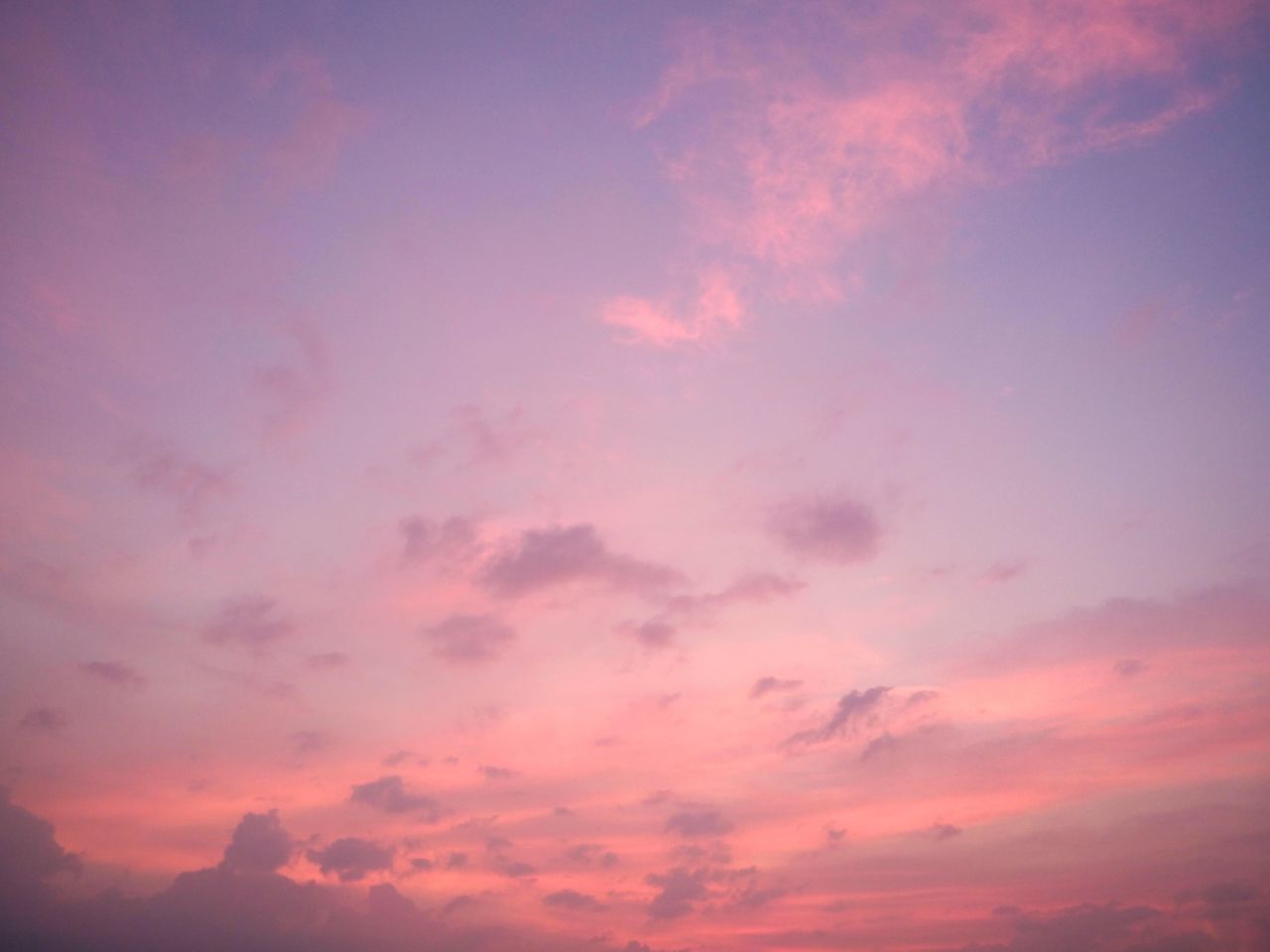 sky, cloud - sky, sunset, beauty in nature, scenics - nature, tranquility, tranquil scene, nature, pink color, orange color, idyllic, no people, low angle view, backgrounds, dusk, dramatic sky, outdoors, cloudscape, atmosphere, purple, meteorology, romantic sky