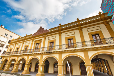 Low angle view of historic building against sky