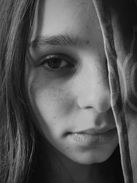 Close-up portrait of young woman