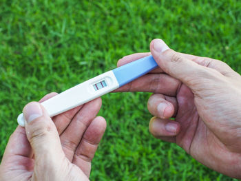 Close-up of person holding hands