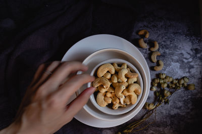 High angle view of woman holding food