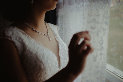 Close-up of woman wearing necklace