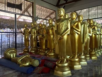 Buddha statue in temple outside building