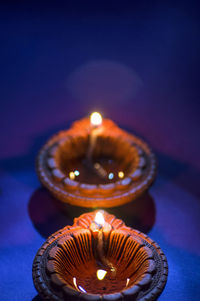 Close-up of lit candle