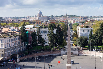 High angle view of street and buildings in city