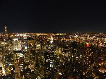 Illuminated cityscape at night