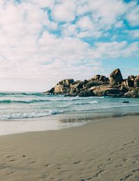 Scenic view of beach against sky