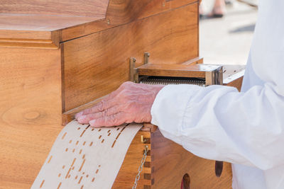 High angle view of man working on wood