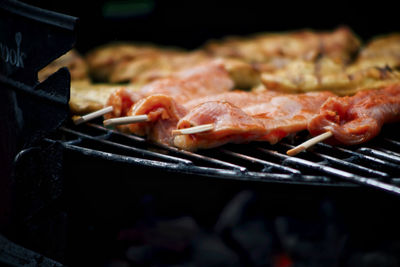 Close-up of meat on barbecue grill