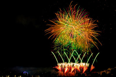 Firework display at night