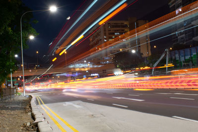 Light trails on city street at night