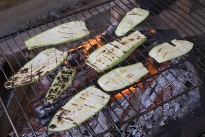 High angle view of zucchini on barbecue grill