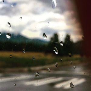 Close-up of water drops on glass