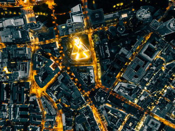 High angle view of illuminated cityscape at night