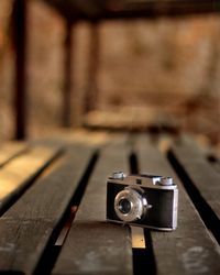 Close-up of camera on table