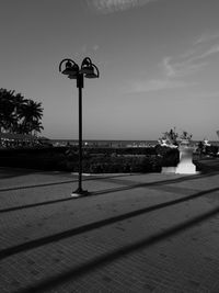 Street light against sky