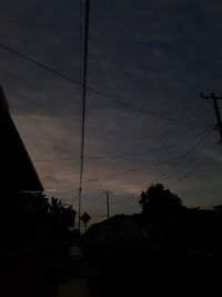 Silhouette trees against sky during sunset