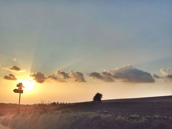 Scenic view of landscape against sky during sunset