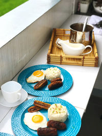 High angle view of breakfast served on table