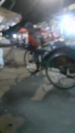 Blurred motion of bicycle on road in city